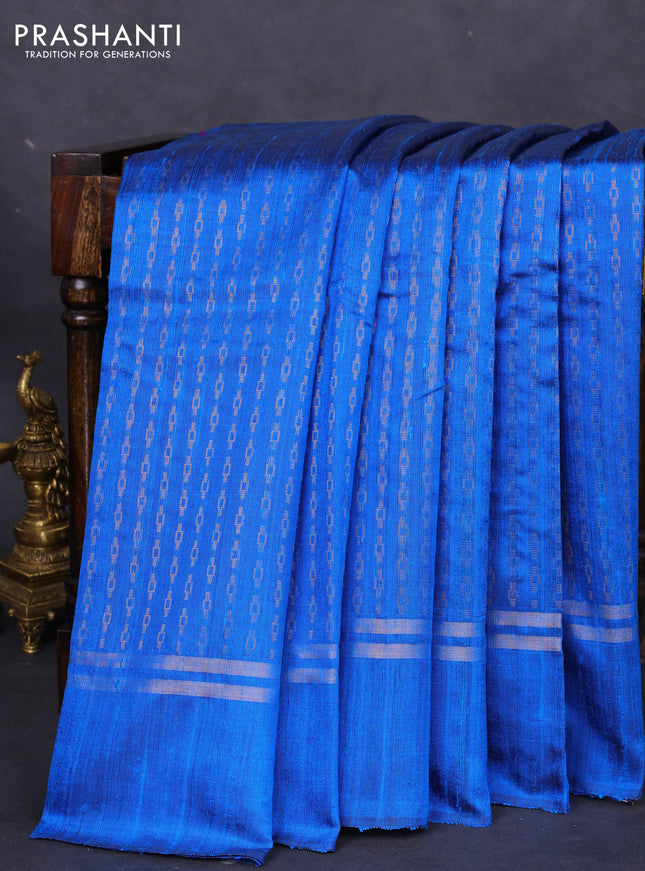 Pure dupion silk saree cs blue with allover zari weaves and zari woven simple border