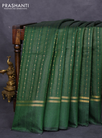 Pure dupion silk saree green with allover zari weaves and zari woven simple border