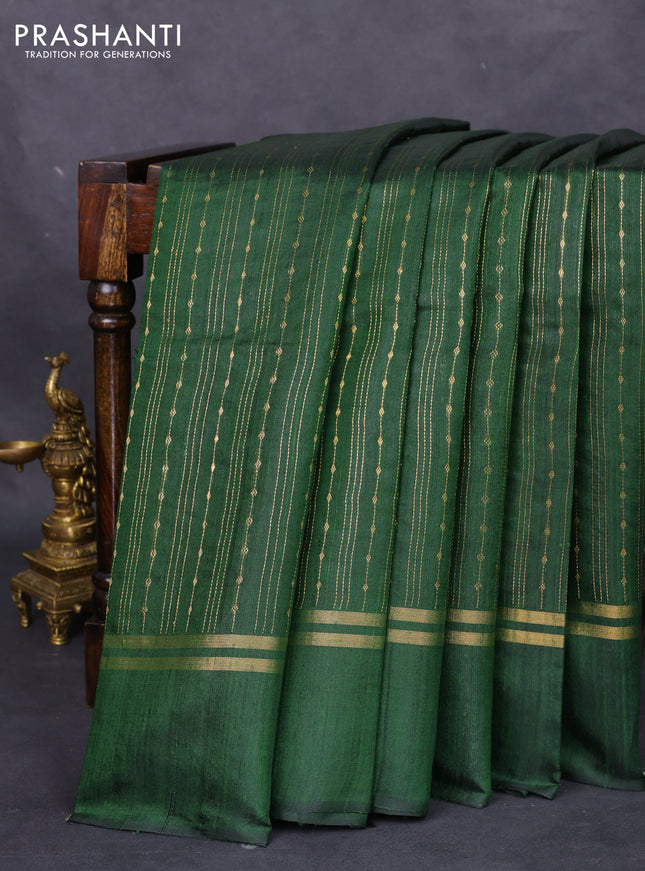 Pure dupion silk saree green with allover zari weaves and zari woven simple border