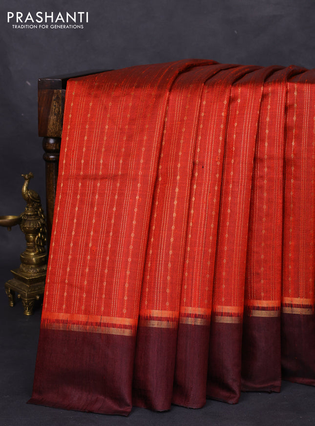 Pure dupion silk saree orange and deep maroon with allover zari weaves and zari woven simple border
