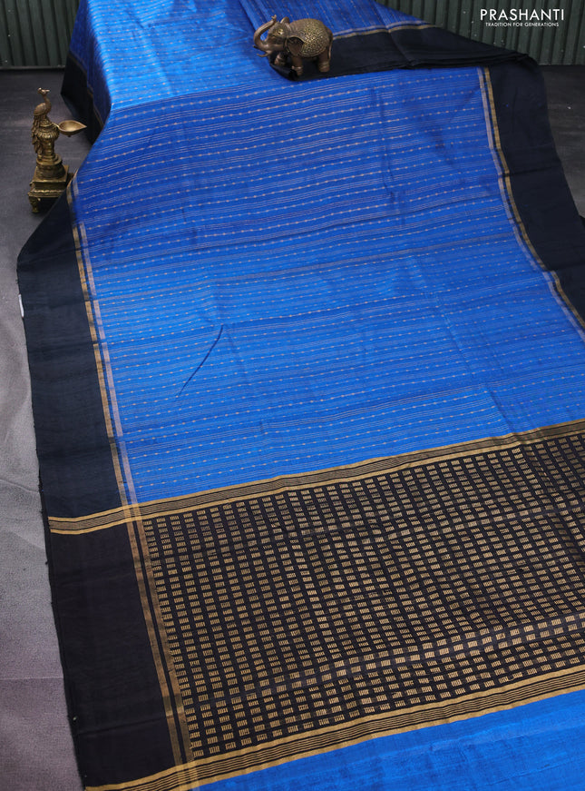 Pure dupion silk saree cs blue and black with allover zari weaves and zari woven simple border