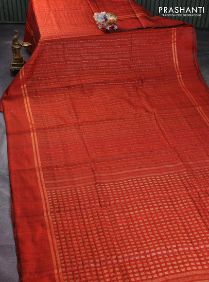 Pure dupion silk saree orange with allover zari weaves and zari woven simple border