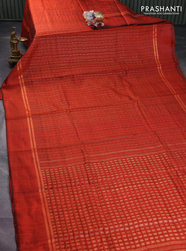 Pure dupion silk saree orange with allover zari weaves and zari woven simple border