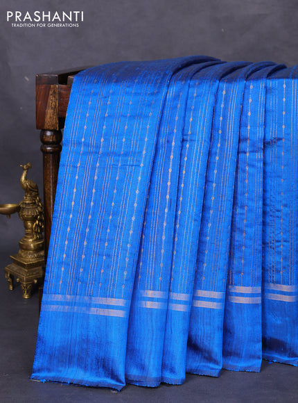 Pure dupion silk saree cs blue with allover zari weaves and zari woven simple border