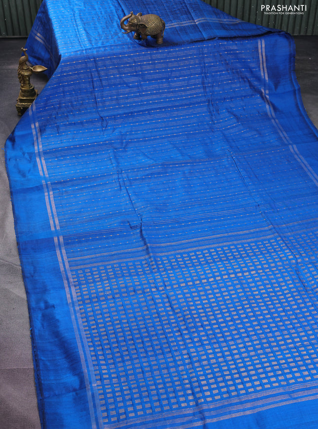 Pure dupion silk saree cs blue with allover zari weaves and zari woven simple border