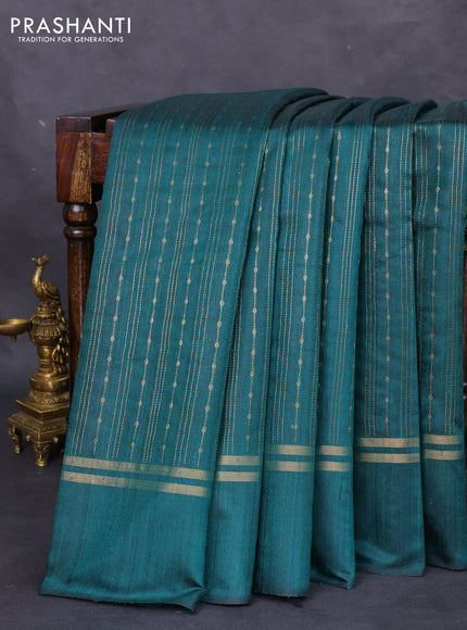 Pure dupion silk saree peacock green with allover zari weaves and zari woven simple border