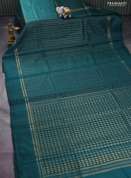 Pure dupion silk saree peacock green with allover zari weaves and zari woven simple border