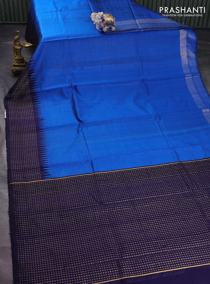 Pure dupion silk saree cs blue and navy blue with plain body and temple design zari butta border