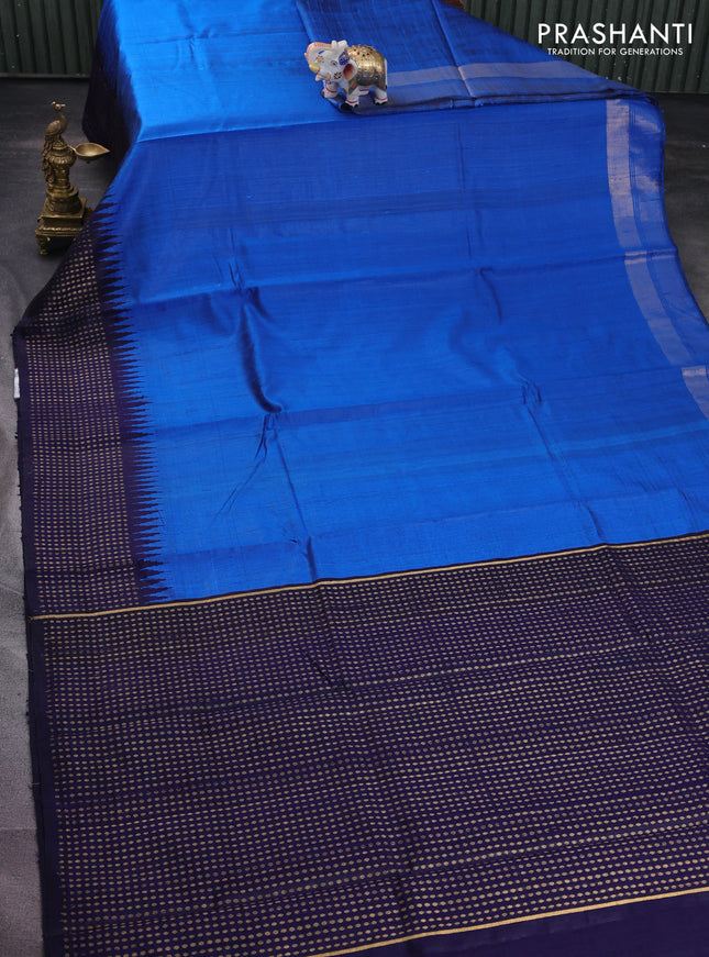 Pure dupion silk saree cs blue and navy blue with plain body and temple design zari butta border