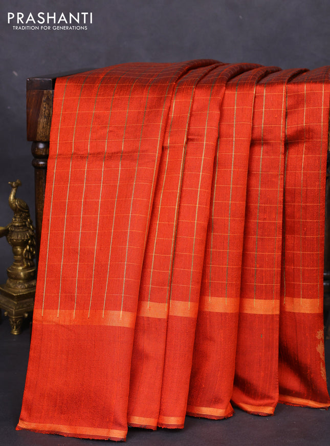 Pure dupion silk saree orange with allover zari checked pattern and zari woven butta border