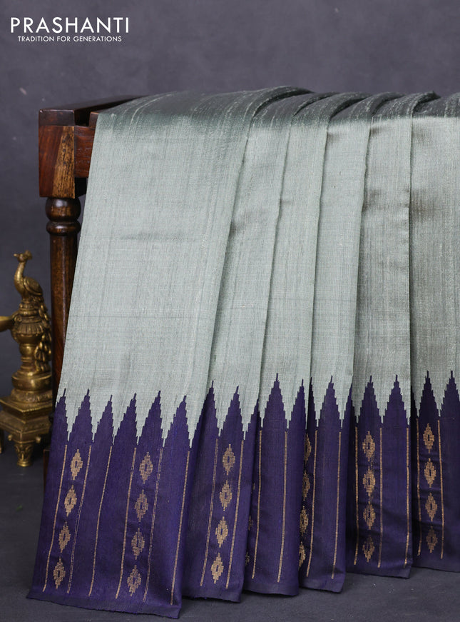 Pure dupion silk saree pastel grey and navy blue with plain body and temple design zari butta border