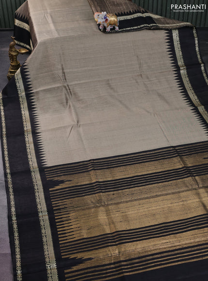 Pure dupion silk saree beige and black with plain body and temple design rettapet thread woven border