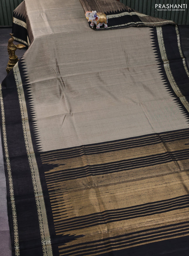Pure dupion silk saree beige and black with plain body and temple design rettapet thread woven border
