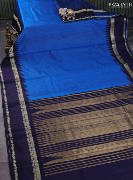 Pure dupion silk saree cs blue and navy blue with plain body and temple design rettapet thread woven border
