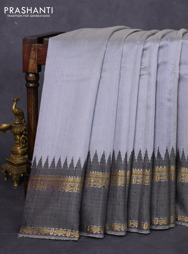 Pure dupion silk saree grey with plain body and temple design rettapet zari woven border