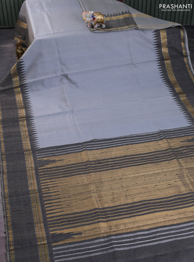 Pure dupion silk saree grey with plain body and temple design rettapet zari woven border