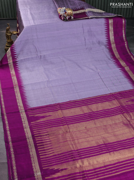 Pure dupion silk saree lavender and purple with plain body and temple design rettapet thread woven border