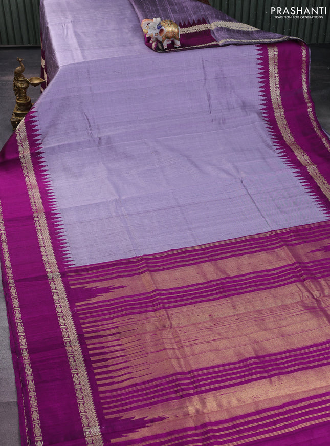 Pure dupion silk saree lavender and purple with plain body and temple design rettapet thread woven border