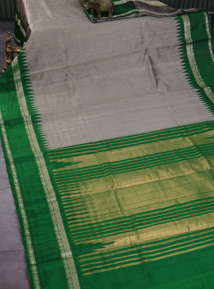 Pure dupion silk saree grey and green with plain body and temple design rettapet zari woven border