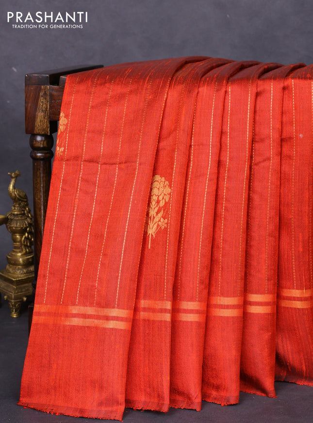 Pure dupion silk saree orange with allover zari weaves and zari woven simple border