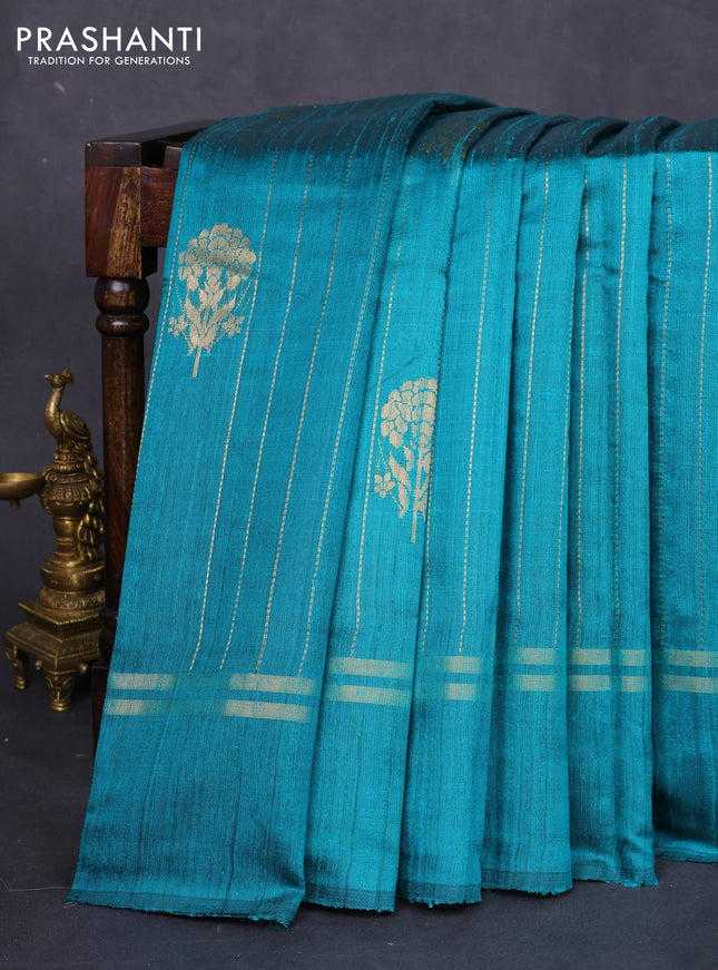 Pure dupion silk saree teal green with allover zari weaves and zari woven simple border