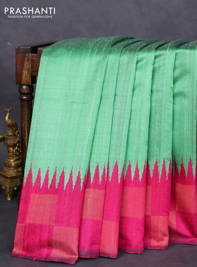 Pure dupion silk saree pastel green and magenta pink with plain body and temple design zari butta border