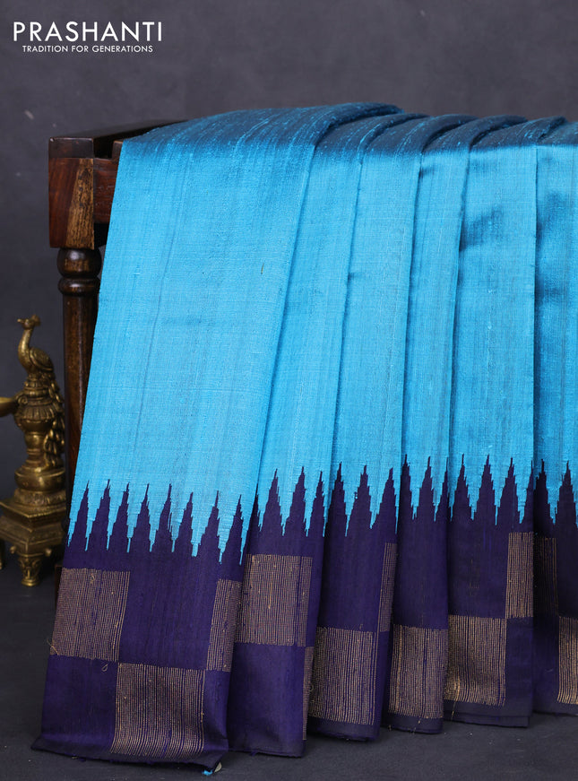 Pure dupion silk saree cs blue and navy blue with plain body and temple design zari butta border