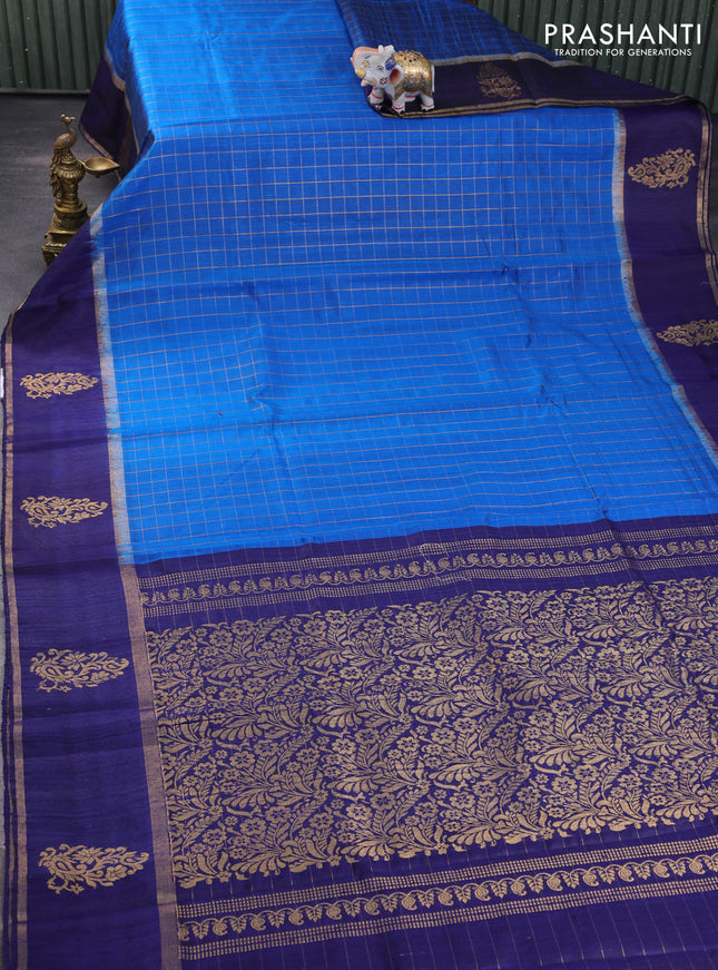 Pure dupion silk saree cs blue and navy blue with allover zari checked pattern and zari woven butta border