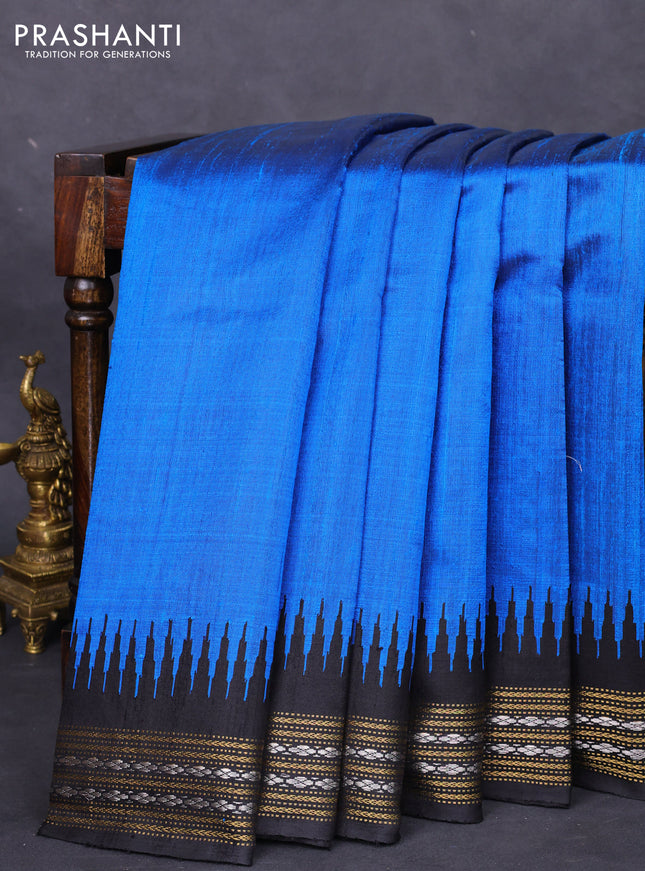 Pure dupion silk saree cs blue and black with plain body and temple design zari woven border