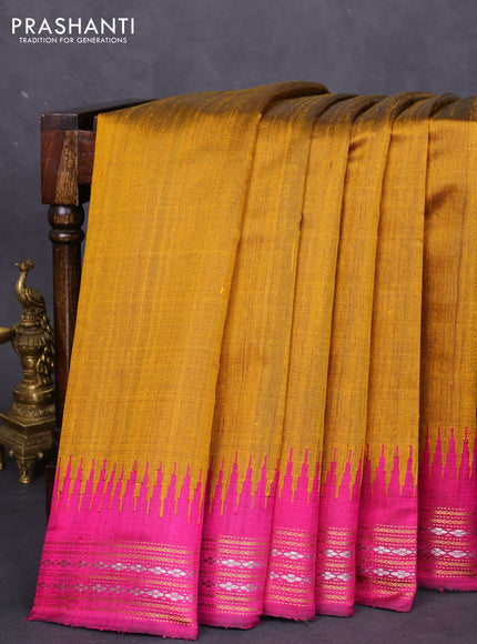 Pure dupion silk saree mustard yellow and magenta pink with plain body and temple design zari woven border