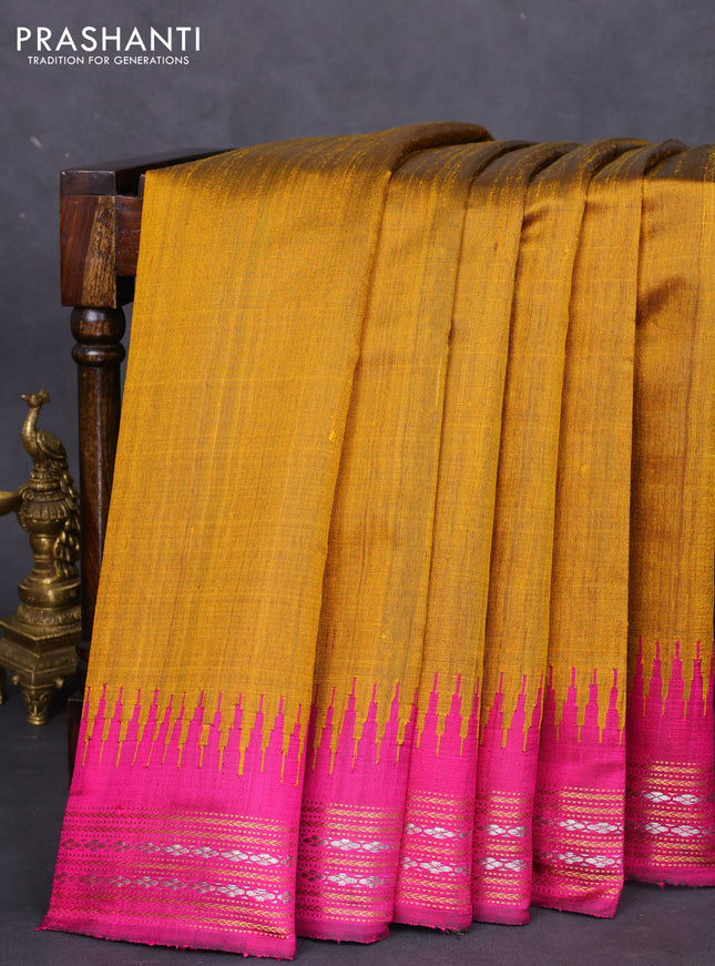 Pure dupion silk saree mustard yellow and magenta pink with plain body and temple design zari woven border