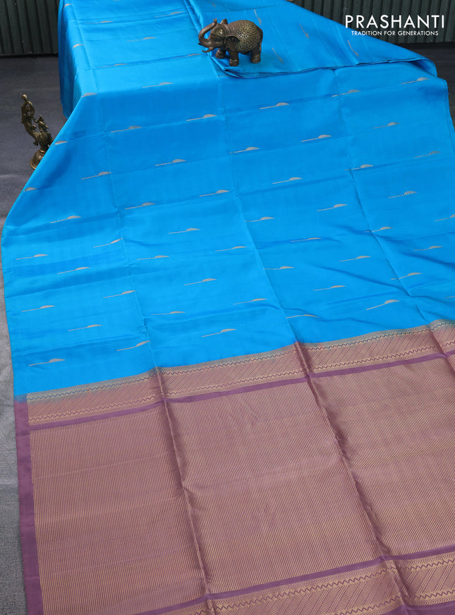 Pure soft silk saree cs blue and mauve pink with zari woven buttas in borderless style