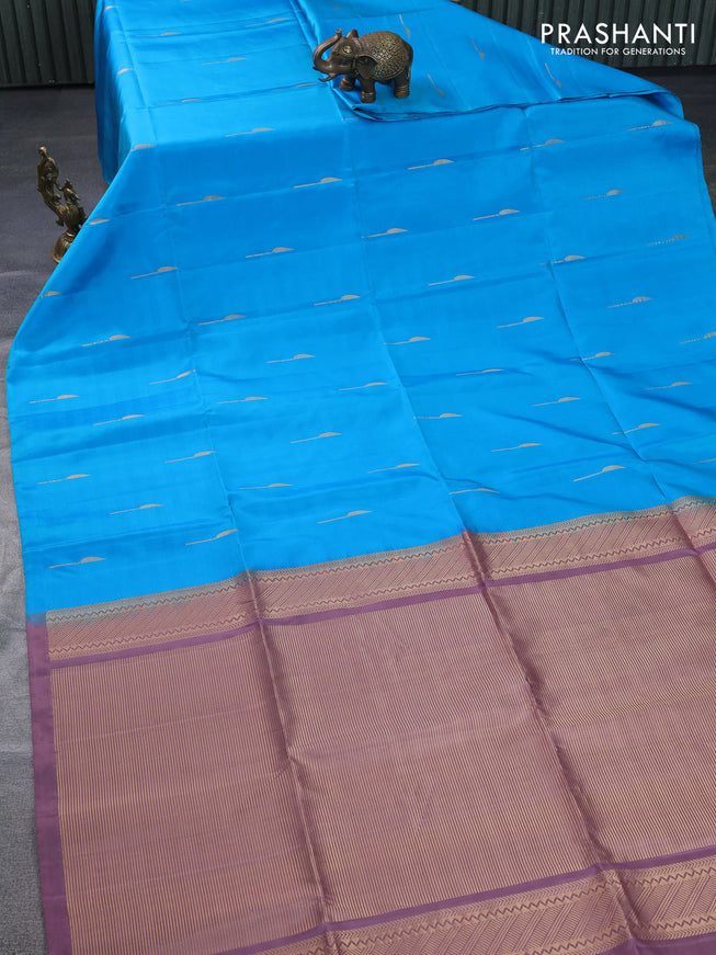 Pure soft silk saree cs blue and mauve pink with zari woven buttas in borderless style