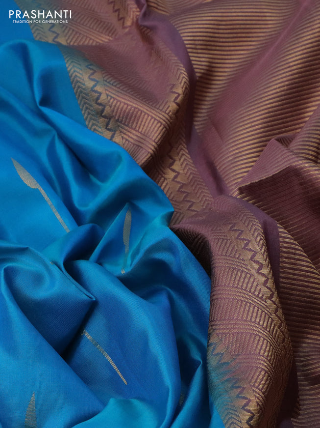 Pure soft silk saree cs blue and mauve pink with zari woven buttas in borderless style