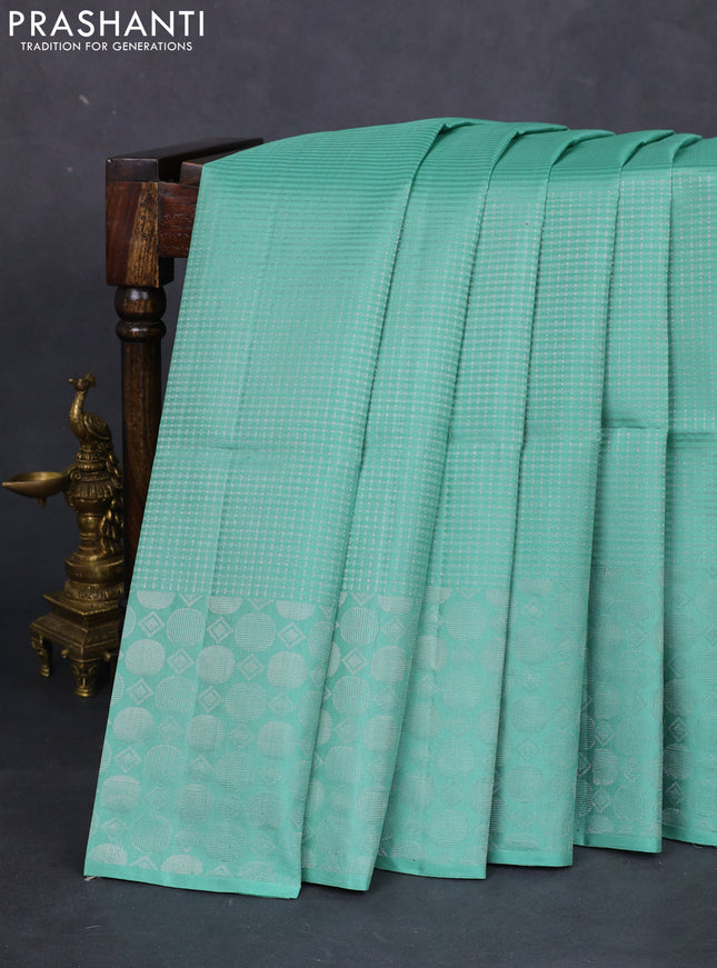 Pure soft silk saree pastel green with allover silver zari weaves and silver zari woven border
