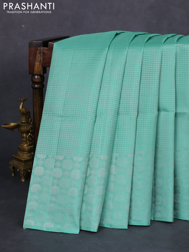 Pure soft silk saree pastel green with allover silver zari weaves and silver zari woven border