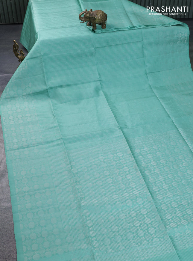 Pure soft silk saree pastel green with allover silver zari weaves and silver zari woven border