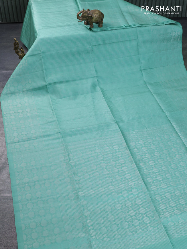 Pure soft silk saree pastel green with allover silver zari weaves and silver zari woven border