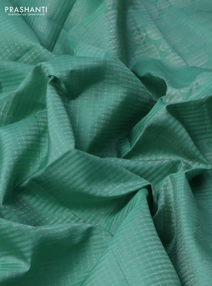 Pure soft silk saree pastel green with allover silver zari weaves and silver zari woven border