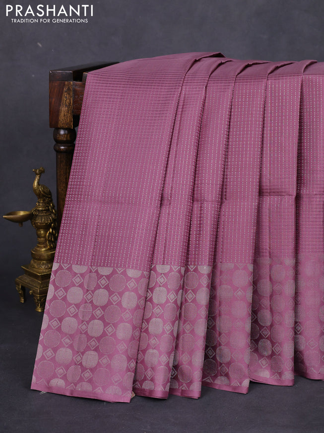 Pure soft silk saree mild purple with allover silver zari weaves and silver zari woven border