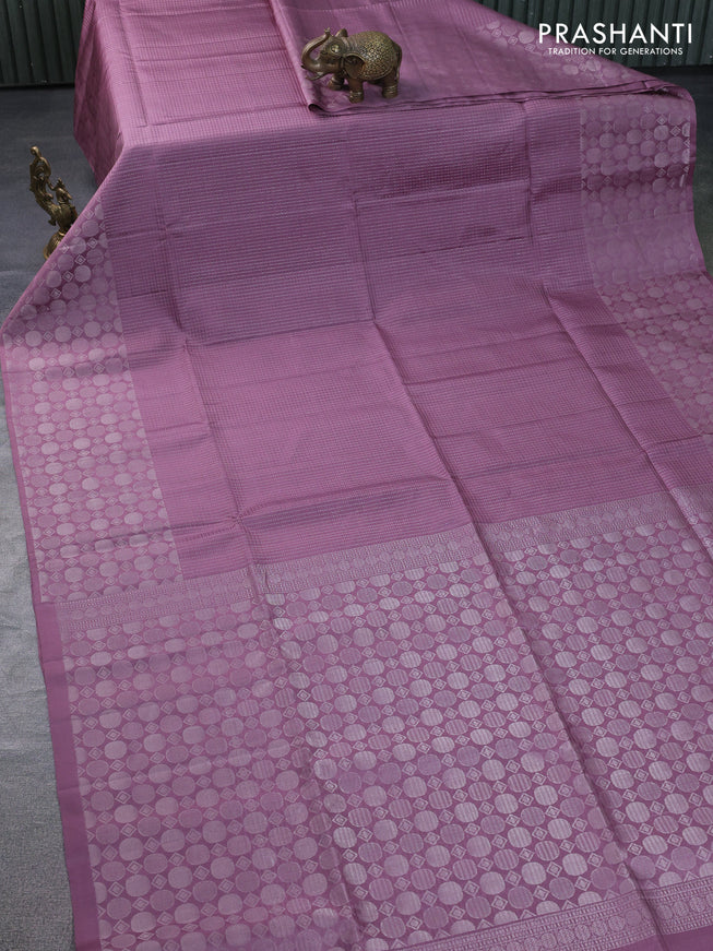 Pure soft silk saree mild purple with allover silver zari weaves and silver zari woven border