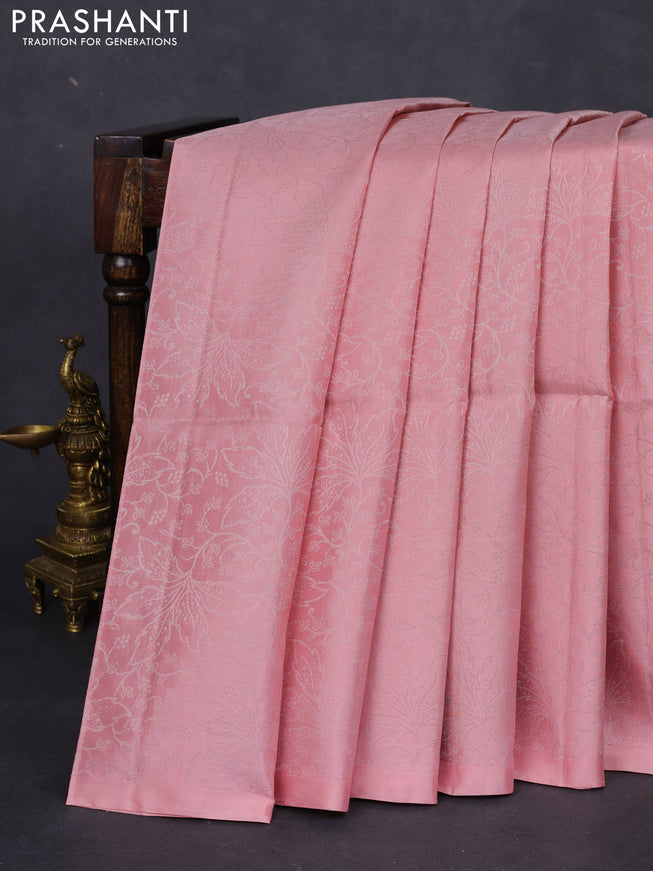 Pure soft silk saree peach shade with allover silver zari woven brocade weaves in borderless style