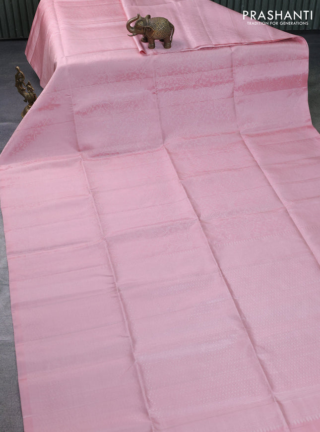 Pure soft silk saree peach shade with allover silver zari woven brocade weaves in borderless style