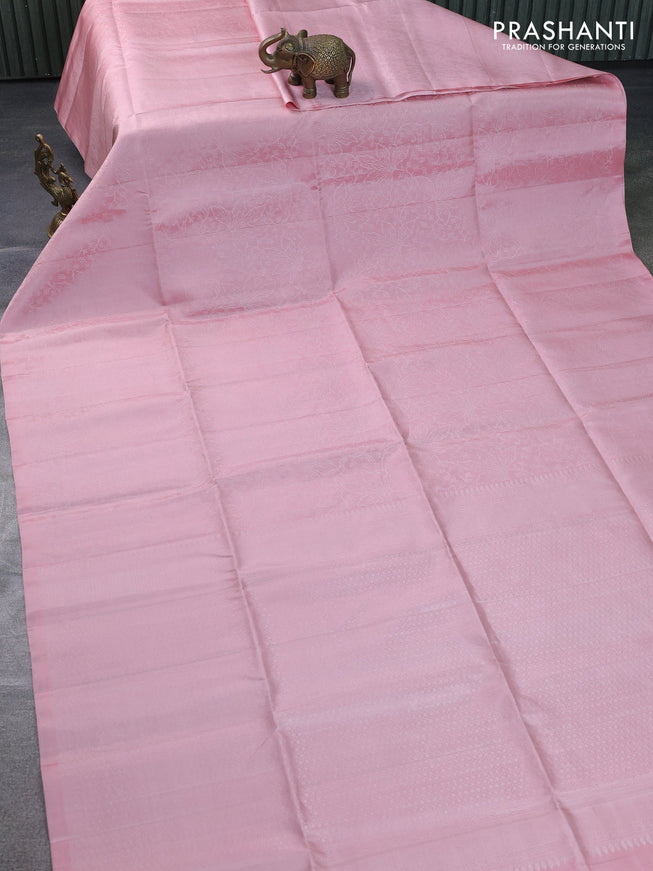 Pure soft silk saree peach shade with allover silver zari woven brocade weaves in borderless style