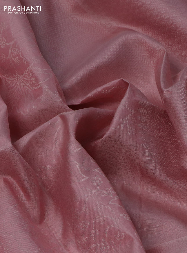 Pure soft silk saree peach shade with allover silver zari woven brocade weaves in borderless style