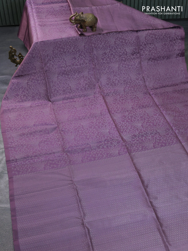 Pure soft silk saree pastel lavender with allover silver zari woven brocade weaves in borderless style