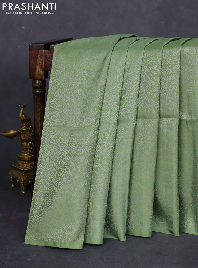 Pure soft silk saree pastel green with allover silver zari woven brocade weaves in borderless style