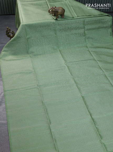 Pure soft silk saree pastel green with allover silver zari woven brocade weaves in borderless style