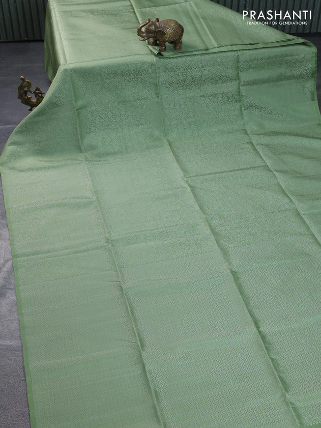 Pure soft silk saree pastel green with allover silver zari woven brocade weaves in borderless style
