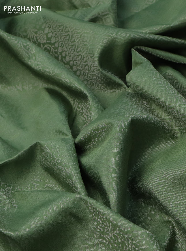 Pure soft silk saree pastel green with allover silver zari woven brocade weaves in borderless style
